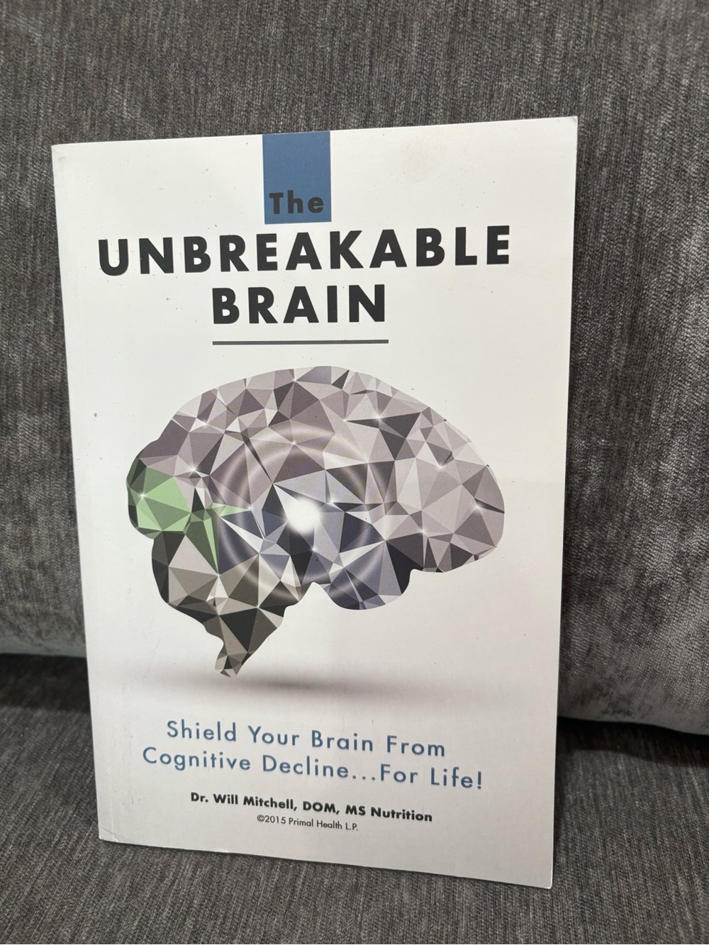 The Unbreakable Brain - White Cover with Geometric Brain Graphic